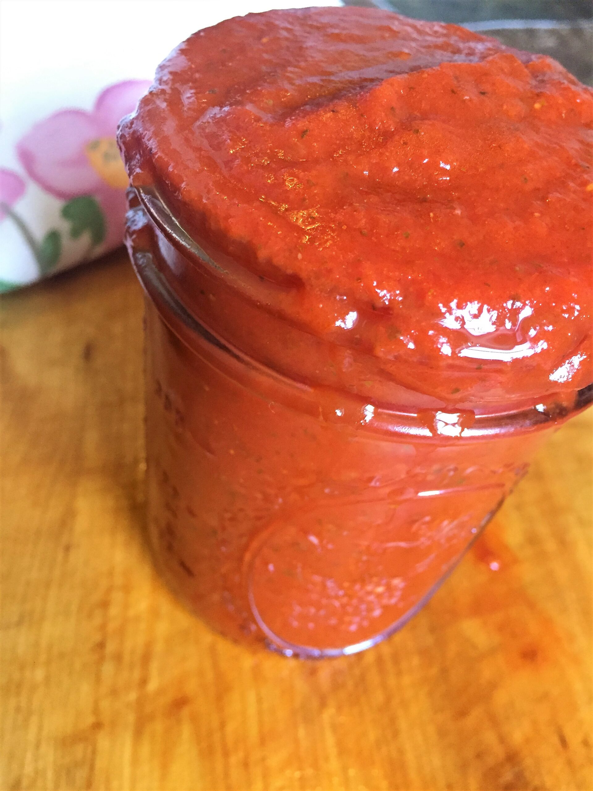 Homemade marinara sauce in mason jar