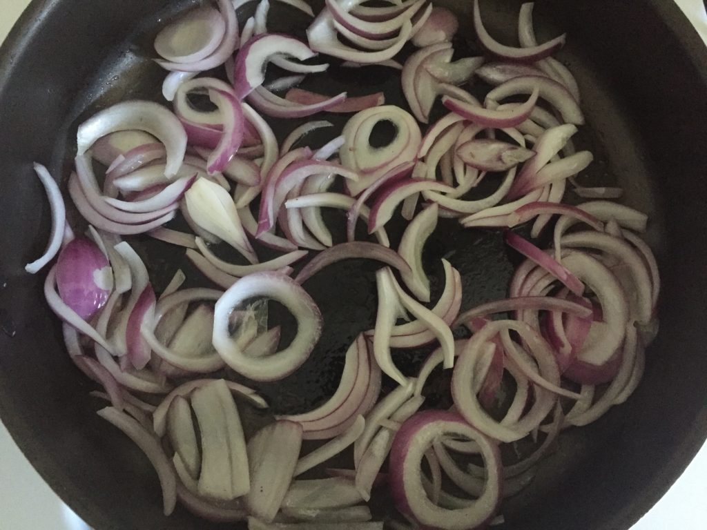 Before Caramelization of purple onions for Mujadara dish courtesy of Vegan Fit Carter