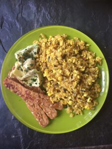 Tofu Scramble with brown rice, tempeh bacon, and avocado