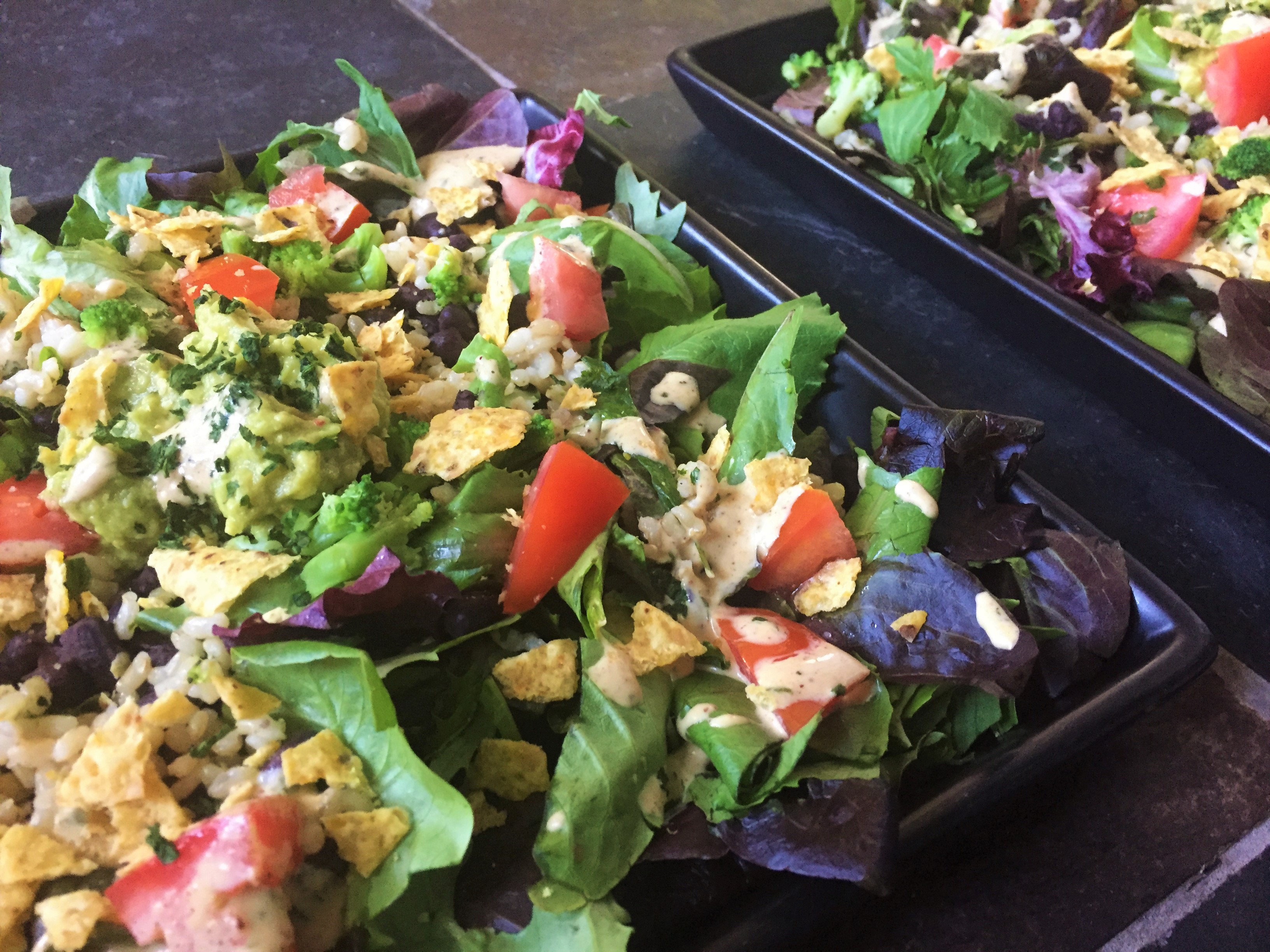 Fiesta Burrito Salad with Cheesy Chipotle Lime dressing recipe courtesy