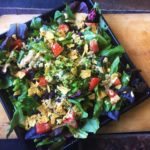 Fiesta Burrito Salad with Cheesy Chipotle Lime dressing recipe courtesy of the Vegan Fit Carter food and fitness blog