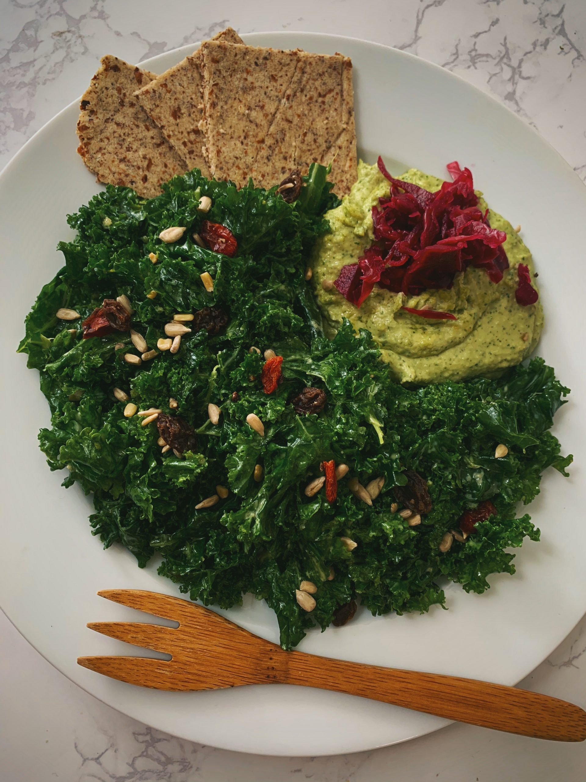 Massaged Kale Salad with side of Cilantro Pepita Hummus recipe courtesy of That Green Lyfe