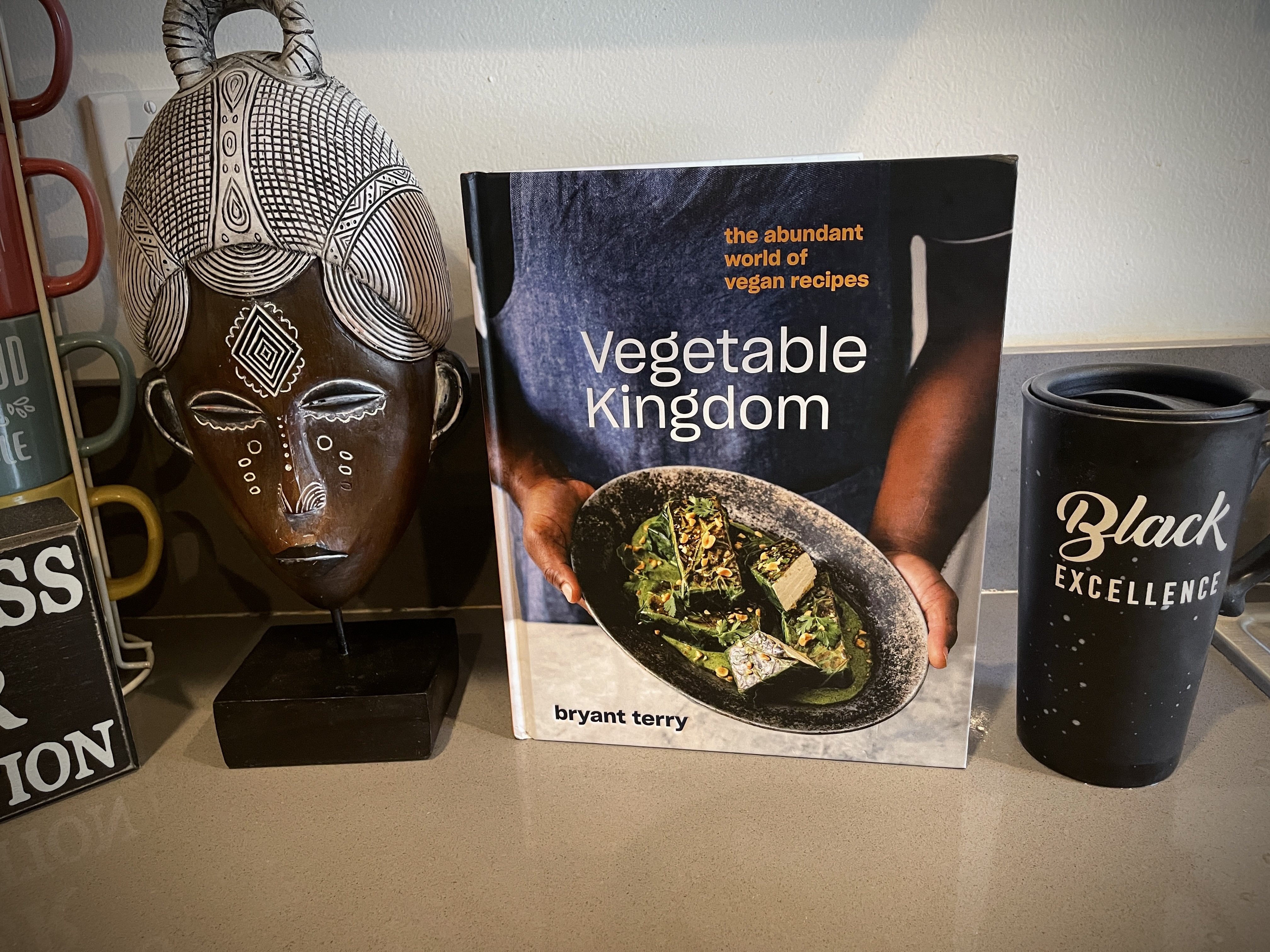 Vegetable Kingdowm Cookbook on counter photo courtesy of That Green Lyfe